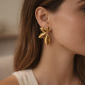 Sushee Gold Leaf Statement Earrings for Women